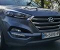 Серый Хендай Туксон, объемом двигателя 2 л и пробегом 19 тыс. км за 25000 $, фото 2 на Automoto.ua
