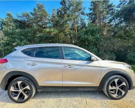 Серый Хендай Туксон, объемом двигателя 2.4 л и пробегом 94 тыс. км за 10700 $, фото 8 на Automoto.ua