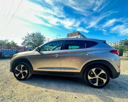 Серый Хендай Туксон, объемом двигателя 2.4 л и пробегом 94 тыс. км за 10700 $, фото 4 на Automoto.ua