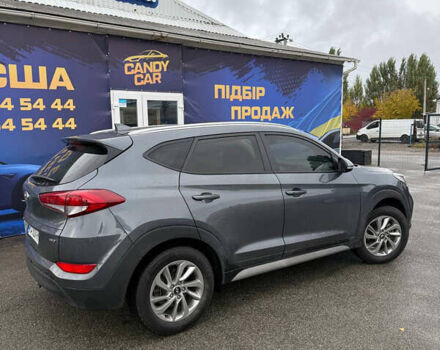 Серый Хендай Туксон, объемом двигателя 2 л и пробегом 92 тыс. км за 15400 $, фото 3 на Automoto.ua