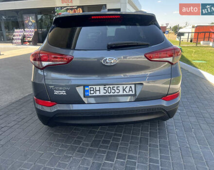Серый Хендай Туксон, объемом двигателя 2 л и пробегом 118 тыс. км за 17200 $, фото 3 на Automoto.ua