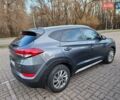 Серый Хендай Туксон, объемом двигателя 2 л и пробегом 134 тыс. км за 14600 $, фото 4 на Automoto.ua