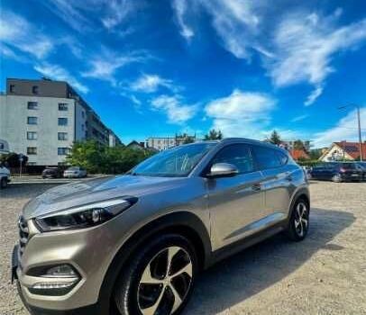 Серый Хендай Туксон, объемом двигателя 2.4 л и пробегом 94 тыс. км за 10700 $, фото 2 на Automoto.ua