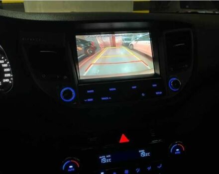 Серый Хендай Туксон, объемом двигателя 2.4 л и пробегом 94 тыс. км за 10700 $, фото 20 на Automoto.ua