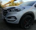 Серый Хендай Туксон, объемом двигателя 2 л и пробегом 146 тыс. км за 19000 $, фото 4 на Automoto.ua