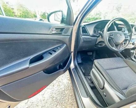 Серый Хендай Туксон, объемом двигателя 2.4 л и пробегом 94 тыс. км за 10700 $, фото 16 на Automoto.ua