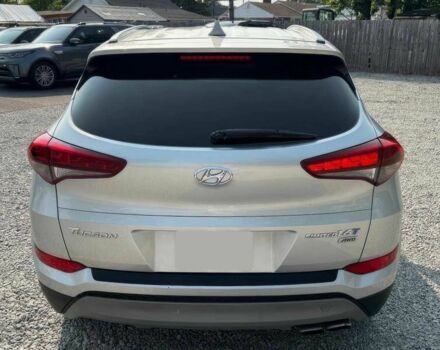 Сірий Хендай Туксон, об'ємом двигуна 1.6 л та пробігом 56 тис. км за 6800 $, фото 6 на Automoto.ua