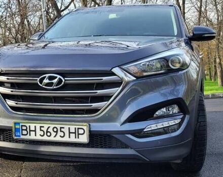 Серый Хендай Туксон, объемом двигателя 2 л и пробегом 19 тыс. км за 25000 $, фото 3 на Automoto.ua