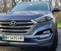 Серый Хендай Туксон, объемом двигателя 2 л и пробегом 19 тыс. км за 25000 $, фото 3 на Automoto.ua