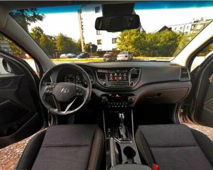 Серый Хендай Туксон, объемом двигателя 2.4 л и пробегом 94 тыс. км за 10700 $, фото 12 на Automoto.ua