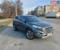 Серый Хендай Туксон, объемом двигателя 2 л и пробегом 107 тыс. км за 16999 $, фото 1 на Automoto.ua