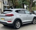Сірий Хендай Туксон, об'ємом двигуна 2 л та пробігом 150 тис. км за 17999 $, фото 2 на Automoto.ua