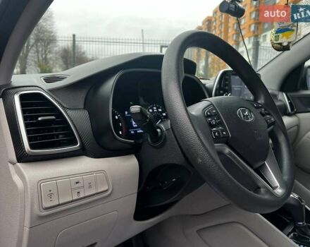 Серый Хендай Туксон, объемом двигателя 1.98 л и пробегом 139 тыс. км за 19500 $, фото 10 на Automoto.ua