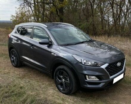 Серый Хендай Туксон, объемом двигателя 2 л и пробегом 99 тыс. км за 9600 $, фото 2 на Automoto.ua