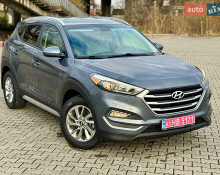 Сірий Хендай Туксон, об'ємом двигуна 2 л та пробігом 184 тис. км за 13950 $, фото 58 на Automoto.ua
