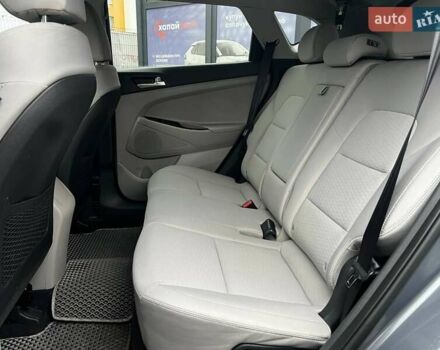 Серый Хендай Туксон, объемом двигателя 1.98 л и пробегом 139 тыс. км за 19500 $, фото 14 на Automoto.ua