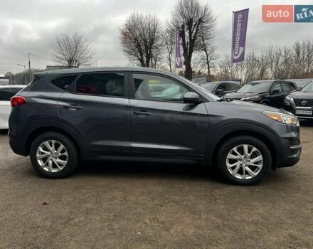 Серый Хендай Туксон, объемом двигателя 1.98 л и пробегом 139 тыс. км за 19500 $, фото 3 на Automoto.ua