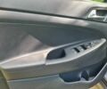Серый Хендай Туксон, объемом двигателя 2 л и пробегом 168 тыс. км за 18400 $, фото 9 на Automoto.ua