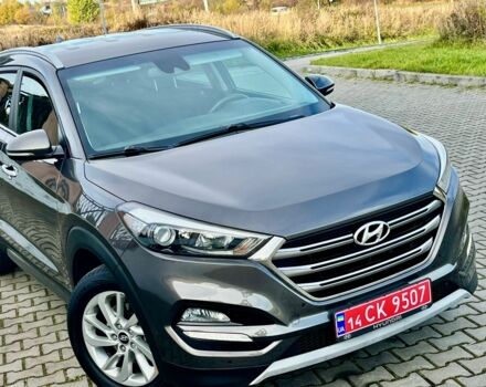 Серый Хендай Туксон, объемом двигателя 2 л и пробегом 115 тыс. км за 13950 $, фото 4 на Automoto.ua