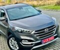 Серый Хендай Туксон, объемом двигателя 2 л и пробегом 115 тыс. км за 13950 $, фото 4 на Automoto.ua