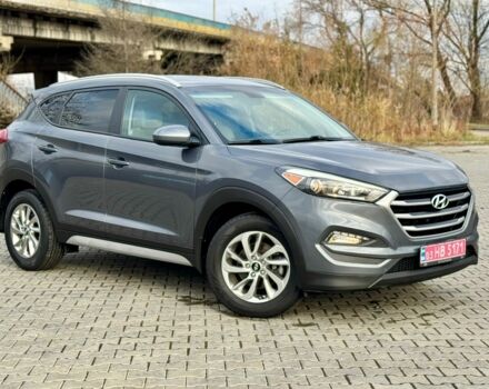 Серый Хендай Туксон, объемом двигателя 2 л и пробегом 115 тыс. км за 13950 $, фото 1 на Automoto.ua