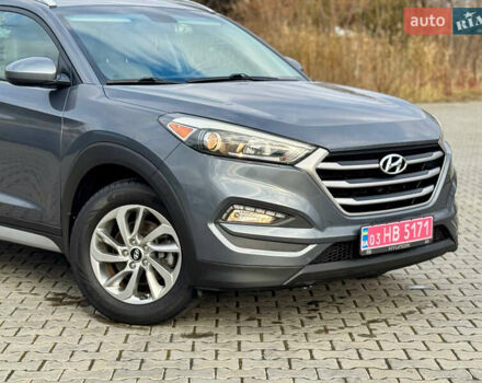 Сірий Хендай Туксон, об'ємом двигуна 2 л та пробігом 184 тис. км за 13950 $, фото 55 на Automoto.ua