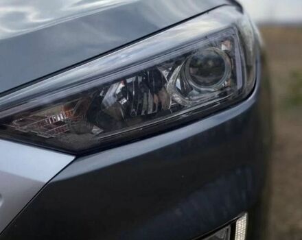 Серый Хендай Туксон, объемом двигателя 2 л и пробегом 99 тыс. км за 9600 $, фото 4 на Automoto.ua