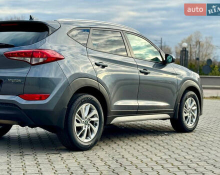 Сірий Хендай Туксон, об'ємом двигуна 2 л та пробігом 184 тис. км за 13950 $, фото 39 на Automoto.ua