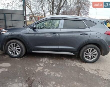 Серый Хендай Туксон, объемом двигателя 2 л и пробегом 128 тыс. км за 16500 $, фото 7 на Automoto.ua