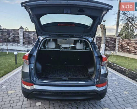 Серый Хендай Туксон, объемом двигателя 2 л и пробегом 68 тыс. км за 15500 $, фото 24 на Automoto.ua