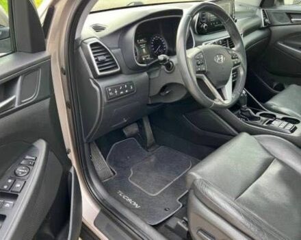 Серый Хендай Туксон, объемом двигателя 1.6 л и пробегом 93 тыс. км за 9000 $, фото 9 на Automoto.ua