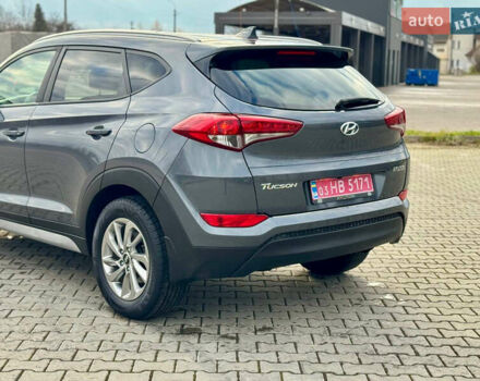 Сірий Хендай Туксон, об'ємом двигуна 2 л та пробігом 184 тис. км за 13950 $, фото 42 на Automoto.ua