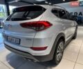 Серый Хендай Туксон, объемом двигателя 2 л и пробегом 127 тыс. км за 21500 $, фото 2 на Automoto.ua