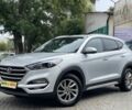 Сірий Хендай Туксон, об'ємом двигуна 2 л та пробігом 150 тис. км за 17999 $, фото 1 на Automoto.ua
