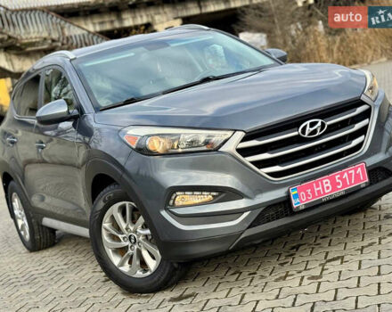 Сірий Хендай Туксон, об'ємом двигуна 2 л та пробігом 184 тис. км за 13950 $, фото 56 на Automoto.ua