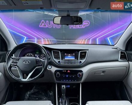 Серый Хендай Туксон, объемом двигателя 1.6 л и пробегом 66 тыс. км за 16999 $, фото 5 на Automoto.ua