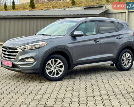 Сірий Хендай Туксон, об'ємом двигуна 2 л та пробігом 184 тис. км за 13950 $, фото 43 на Automoto.ua