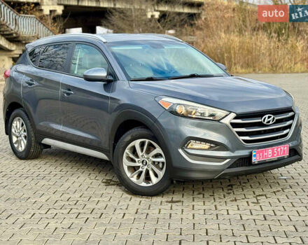 Сірий Хендай Туксон, об'ємом двигуна 2 л та пробігом 184 тис. км за 13950 $, фото 64 на Automoto.ua