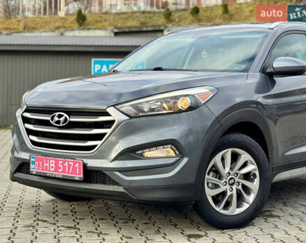 Сірий Хендай Туксон, об'ємом двигуна 2 л та пробігом 184 тис. км за 13950 $, фото 12 на Automoto.ua
