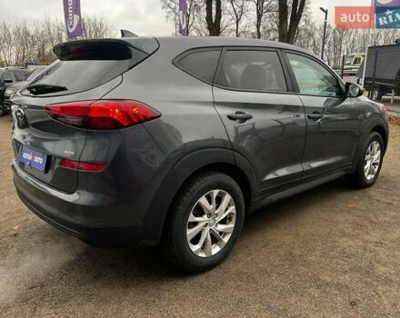 Серый Хендай Туксон, объемом двигателя 1.98 л и пробегом 139 тыс. км за 19500 $, фото 4 на Automoto.ua