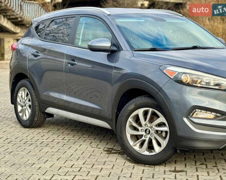 Сірий Хендай Туксон, об'ємом двигуна 2 л та пробігом 184 тис. км за 13950 $, фото 54 на Automoto.ua