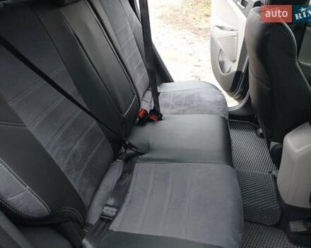 Серый Хендай Туксон, объемом двигателя 2 л и пробегом 128 тыс. км за 16500 $, фото 5 на Automoto.ua