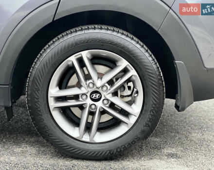 Серый Хендай Туксон, объемом двигателя 2 л и пробегом 117 тыс. км за 20600 $, фото 16 на Automoto.ua