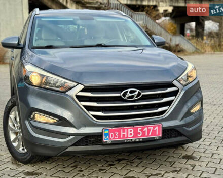 Сірий Хендай Туксон, об'ємом двигуна 2 л та пробігом 184 тис. км за 13950 $, фото 61 на Automoto.ua