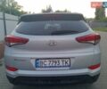 Сірий Хендай Туксон, об'ємом двигуна 2 л та пробігом 75 тис. км за 15000 $, фото 18 на Automoto.ua