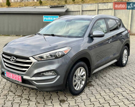 Сірий Хендай Туксон, об'ємом двигуна 2 л та пробігом 184 тис. км за 13950 $, фото 6 на Automoto.ua