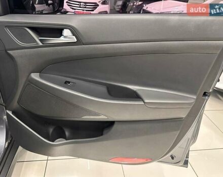 Серый Хендай Туксон, объемом двигателя 2 л и пробегом 69 тыс. км за 20900 $, фото 19 на Automoto.ua