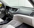 Серый Хендай Туксон, объемом двигателя 2 л и пробегом 69 тыс. км за 8000 $, фото 7 на Automoto.ua