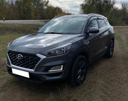 Серый Хендай Туксон, объемом двигателя 2 л и пробегом 99 тыс. км за 9600 $, фото 1 на Automoto.ua