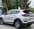 Сірий Хендай Туксон, об'ємом двигуна 2 л та пробігом 150 тис. км за 17999 $, фото 6 на Automoto.ua